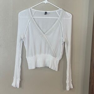Divided White V-Neck Blouse with Embroidered Trim